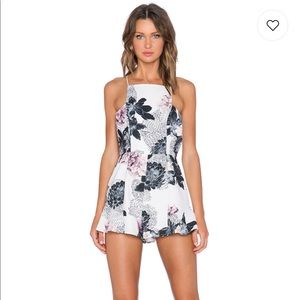 Restless heart playsuit in ivory layered floral
